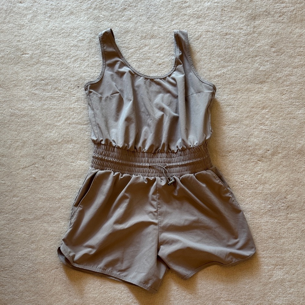Tan travelers Romper Abercrombie